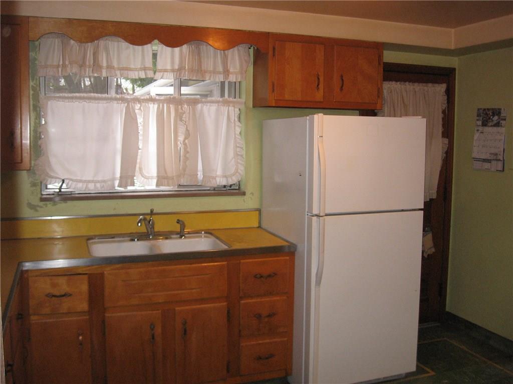 1586 Bellmonte Road Franklin Park, PA 15237 - Photo 5 of 15 Kitchen adjoins the dining room and rear covered porch that could be converted to a family room.