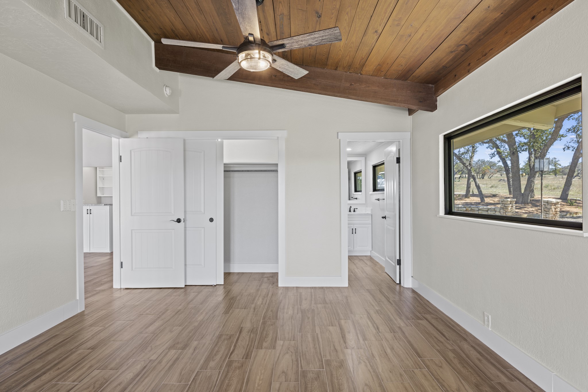 241 Highway 87 Comfort, TX 78013 - Photo 12 of 40 a view of empty room with wooden floor