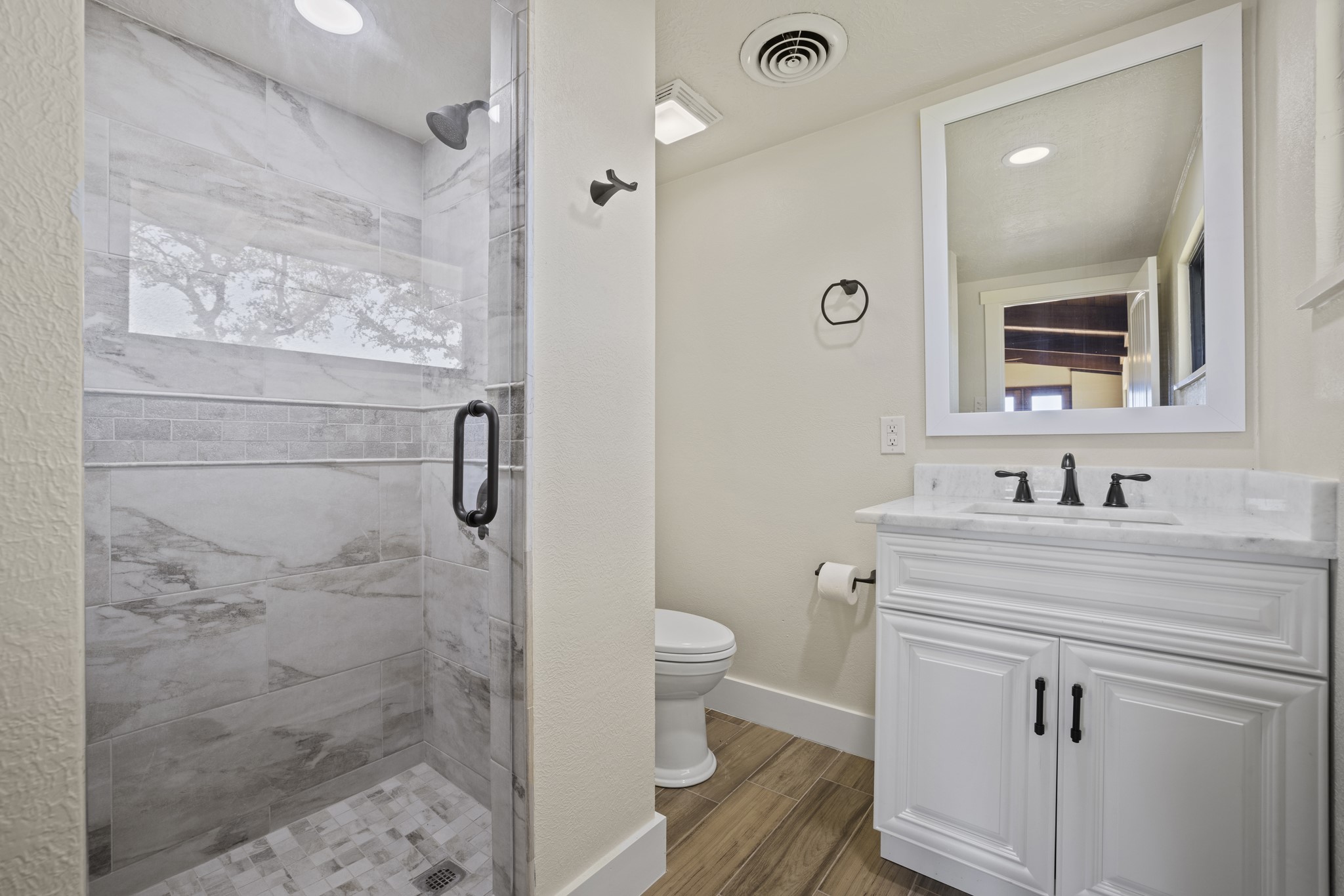 241 Highway 87 Comfort, TX 78013 - Photo 13 of 40 a bathroom with a sink a toilet and shower