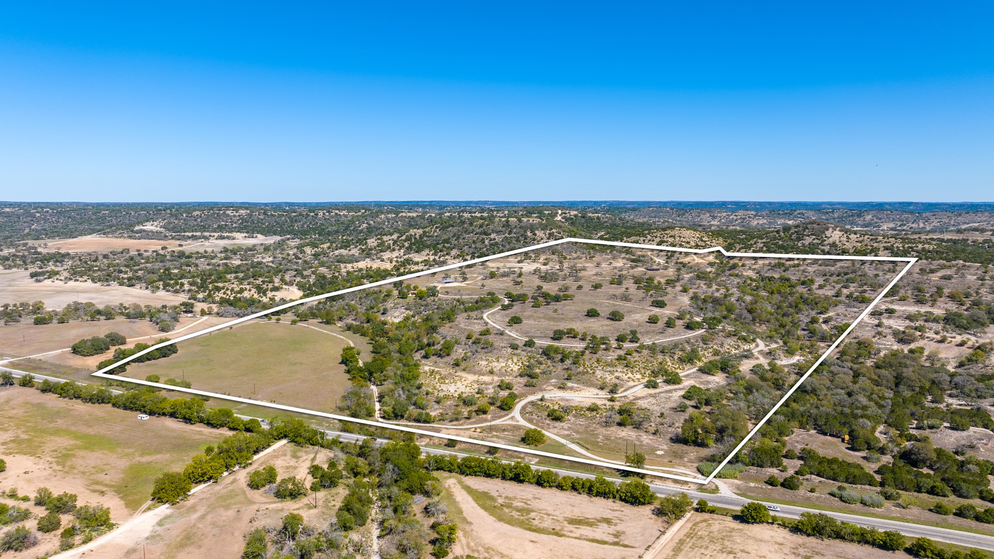 241 Highway 87 Comfort, TX 78013 - Photo 2 of 40 an aerial view of residential houses with outdoor space