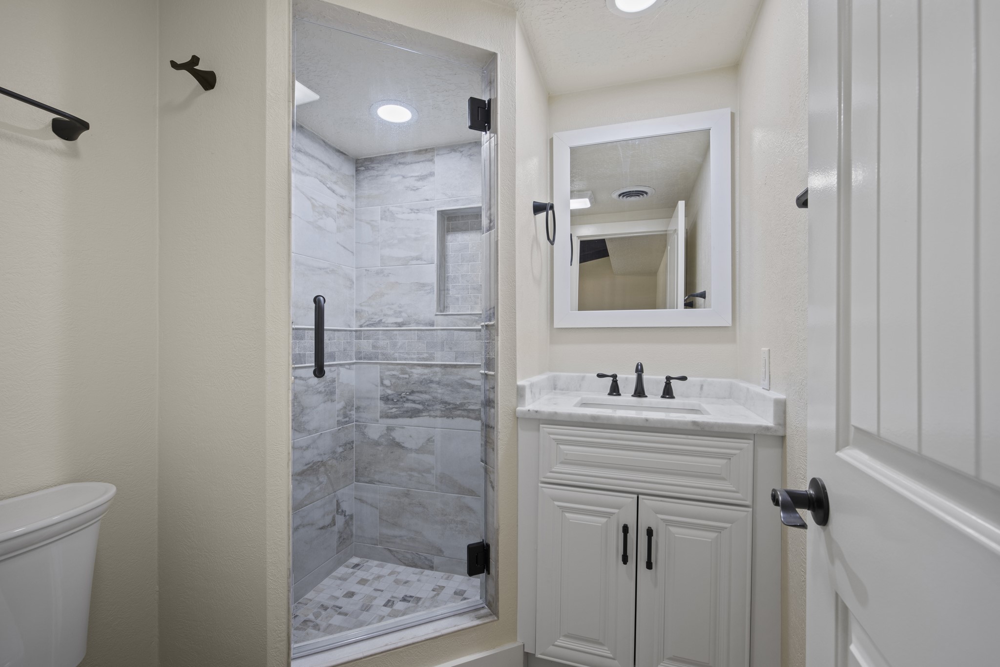 241 Highway 87 Comfort, TX 78013 - Photo 27 of 39 a bathroom with a sink a toilet and shower