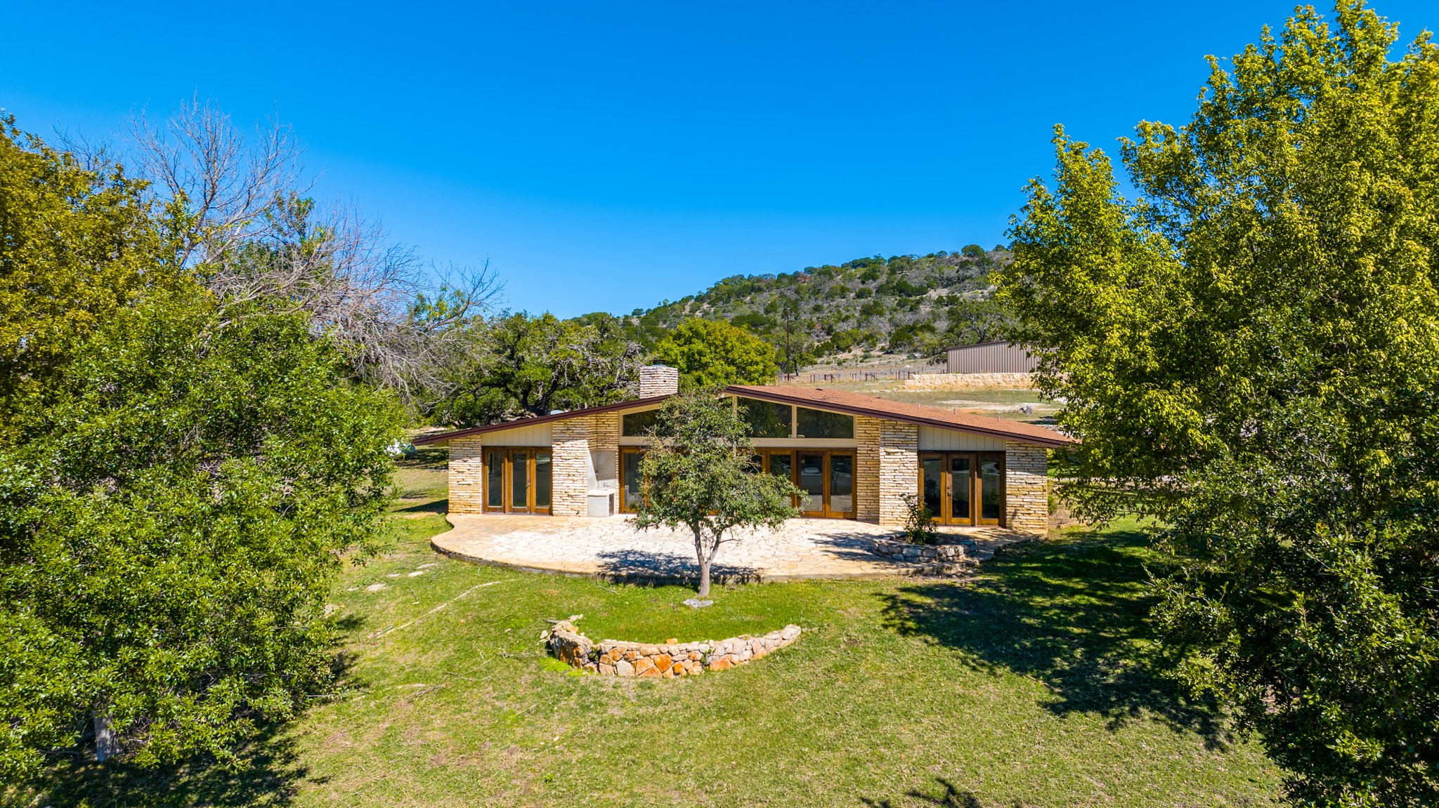 241 Highway 87 Comfort, TX 78013 - Photo 29 of 40 a front view of a house with a yard