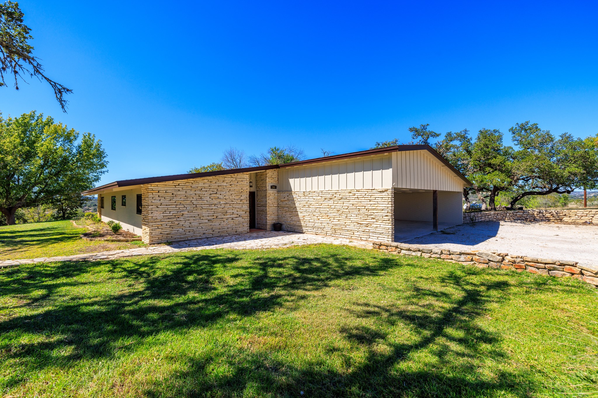 241 Highway 87 Comfort, TX 78013 - Photo 29 of 39 a backyard of a house with plants and wooden fence