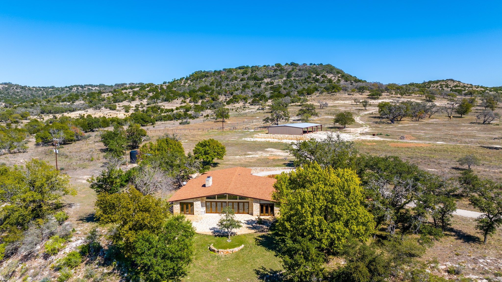 241 Highway 87 Comfort, TX 78013 - Photo 3 of 40 a view of a lake with a mountain in the background