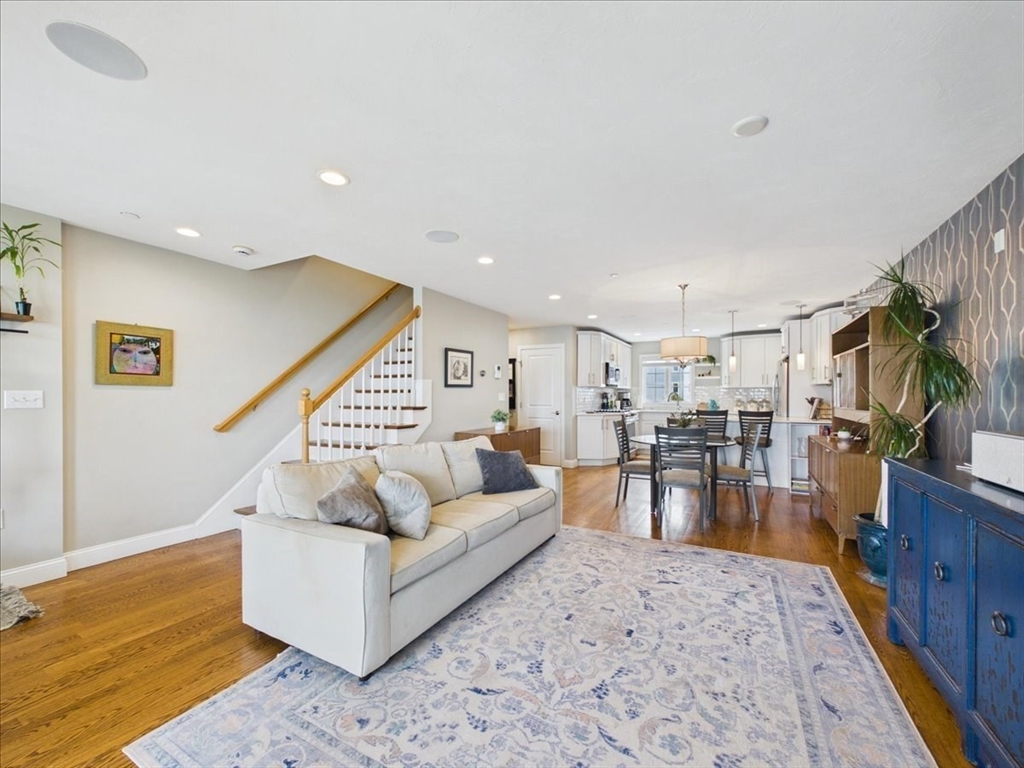 7 Bay Street, Unit 3 Hull, MA 02045 - Photo 10 of 40 a living room with furniture and a rug