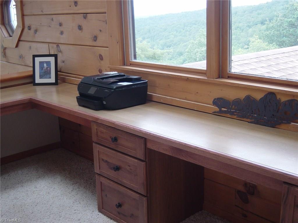 326 Cherokee Lane Purlear, NC 28665 - Photo 19 of 30 Enjoy long range views in home office/study off primary bedroom suite.