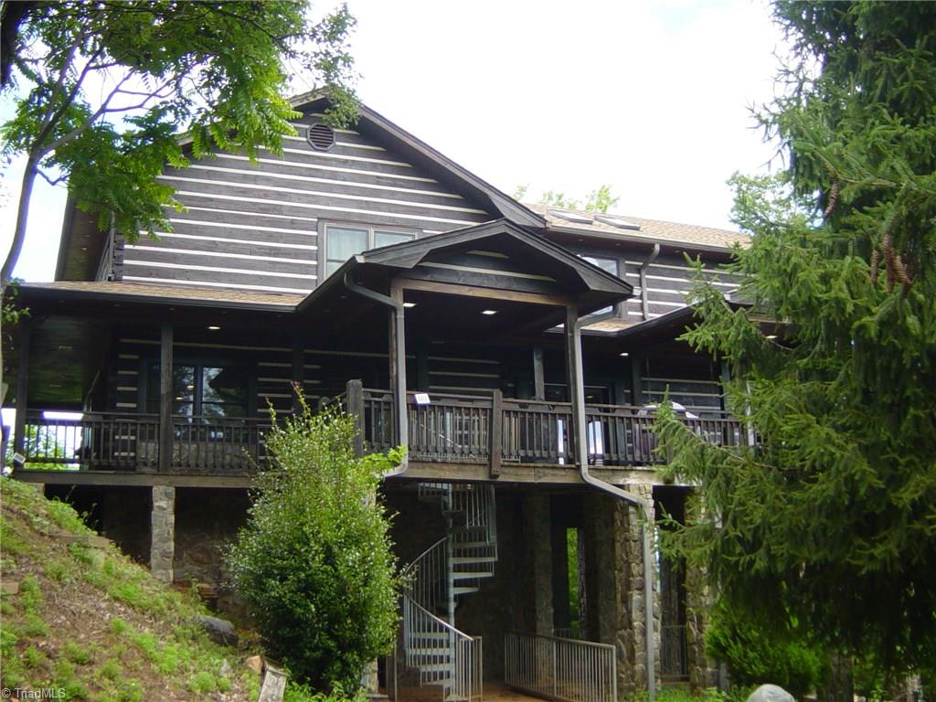 326 Cherokee Lane Purlear, NC 28665 - Photo 3 of 30 decks and patio with spiral staircase going down.