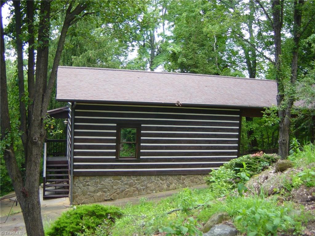 326 Cherokee Lane Purlear, NC 28665 - Photo 30 of 30 Detached garage with lots of storage. Has it's own concrete drive.