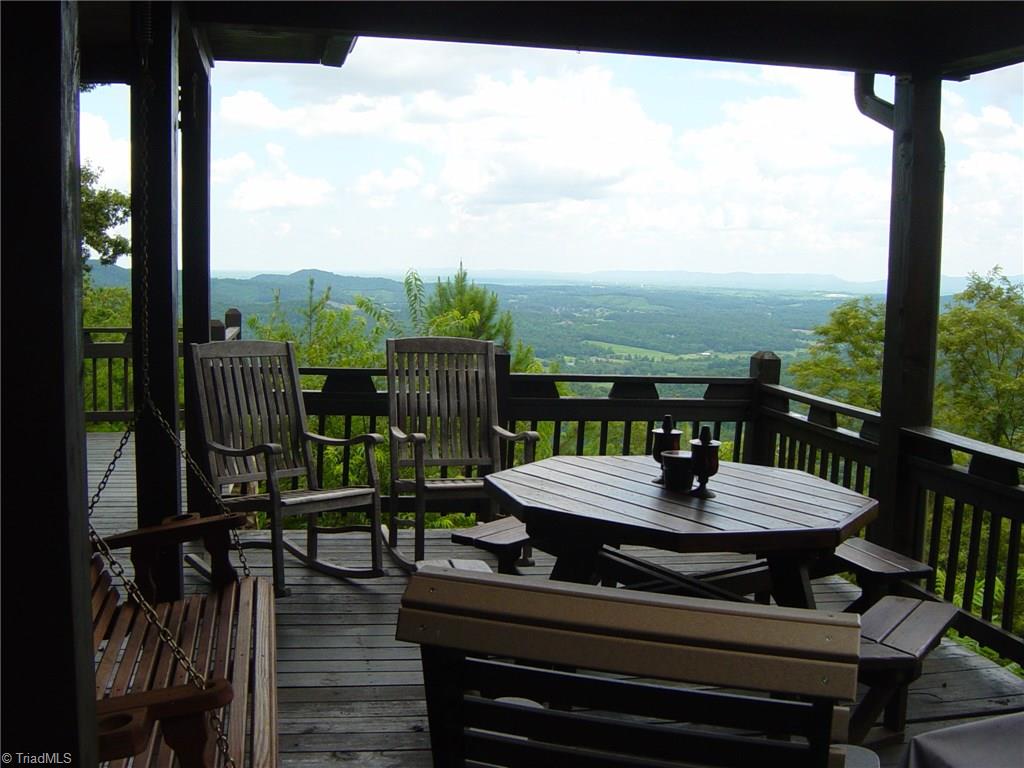 326 Cherokee Lane Purlear, NC 28665 - Photo 7 of 30 Enjoy views from covered porch off living room.