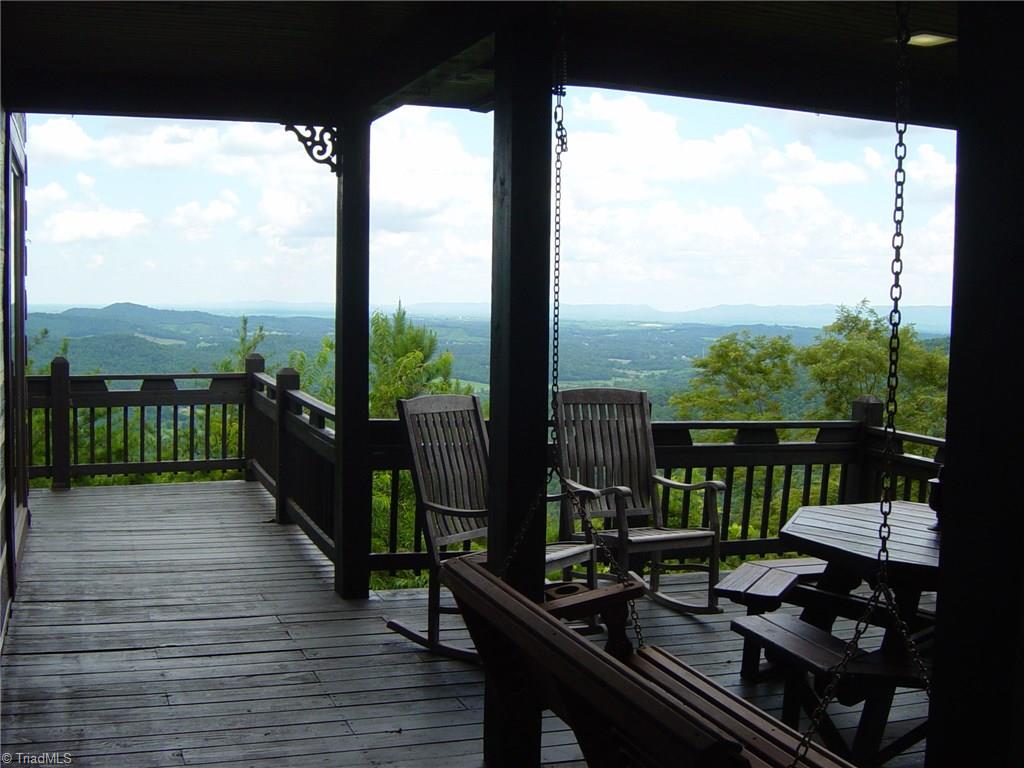 326 Cherokee Lane Purlear, NC 28665 - Photo 8 of 30 Wrap around deck offers more outdoor living space to enjoy !