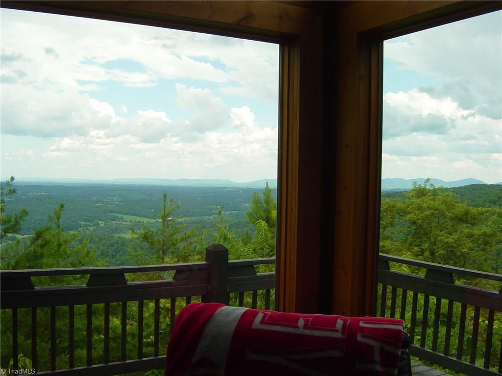 326 Cherokee Lane Purlear, NC 28665 - Photo 9 of 30 View out of large windows in cozy living room!