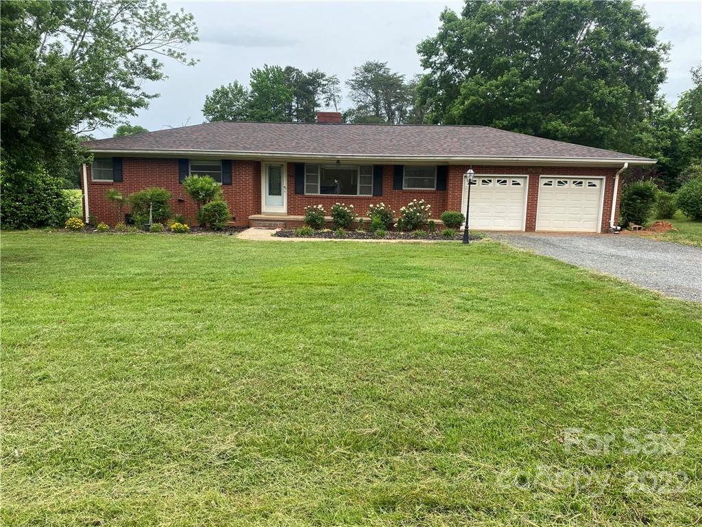 280 Stone Road, Unit 16 Salisbury, NC 28146 - Photo 1 of 25 a front view of a house with a yard