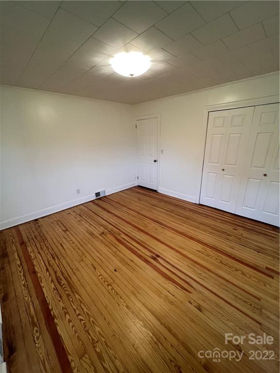 280 Stone Road, Unit 16 Salisbury, NC 28146 - Photo 15 of 25 a view of empty room with wooden floor