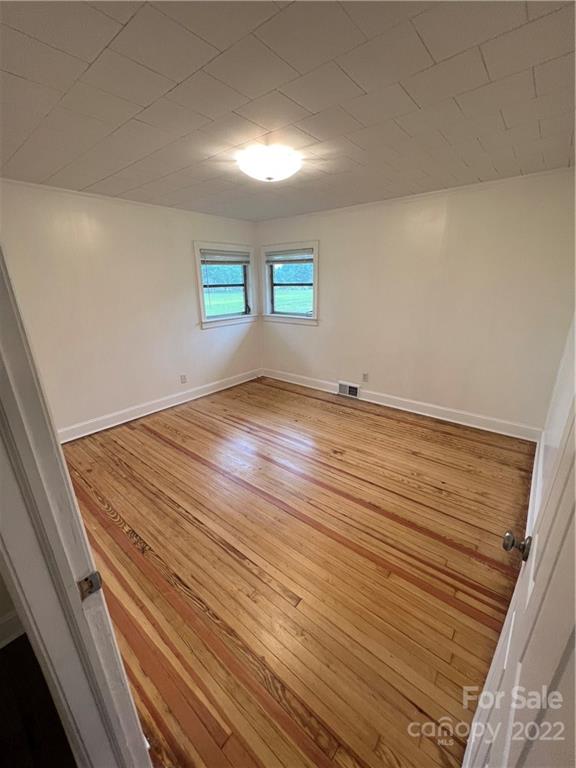 280 Stone Road, Unit 16 Salisbury, NC 28146 - Photo 17 of 25 a view of empty room with wooden floor