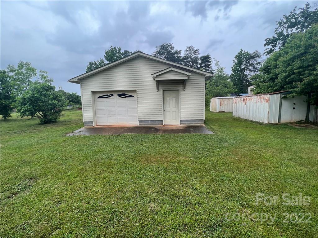 280 Stone Road, Unit 16 Salisbury, NC 28146 - Photo 21 of 25 a view of a house with a yard