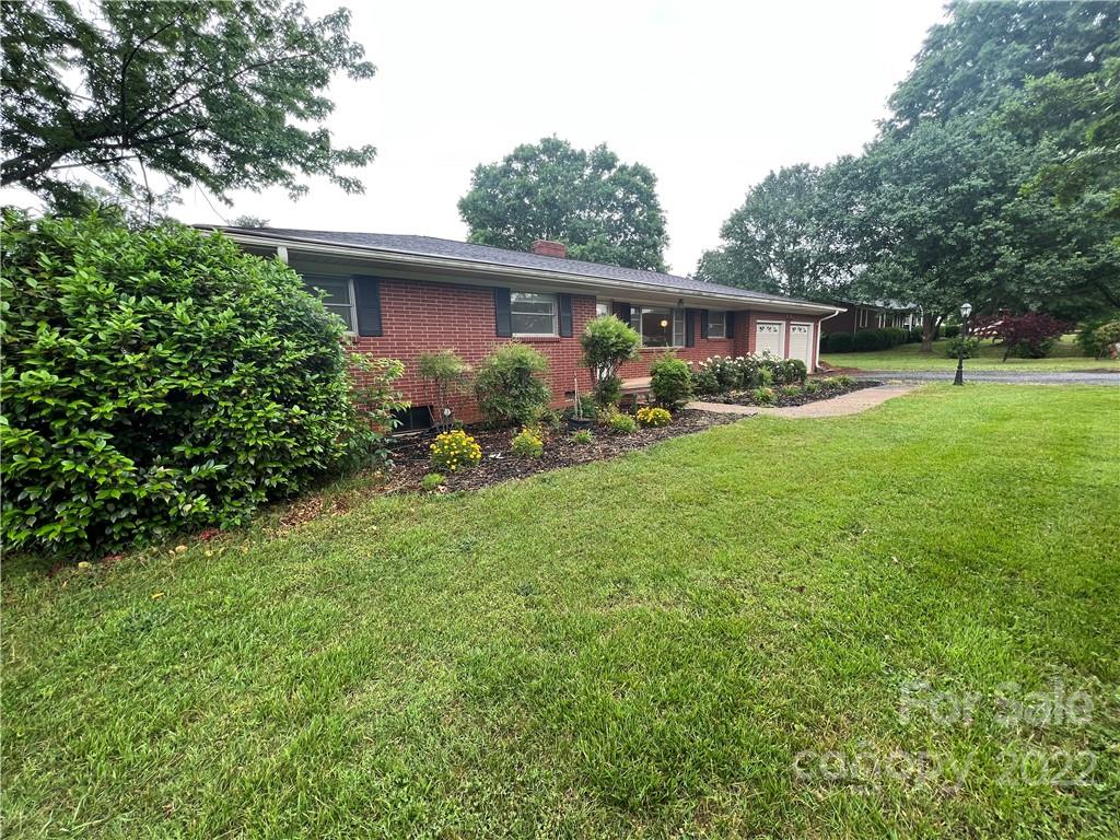 280 Stone Road, Unit 16 Salisbury, NC 28146 - Photo 4 of 25 a front view of house with yard and trees