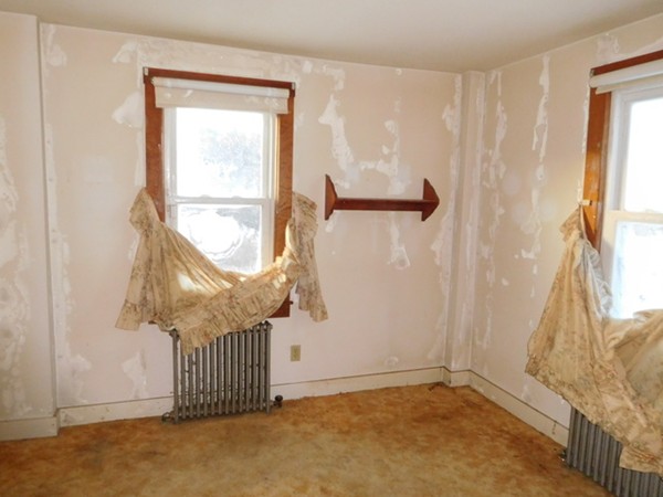 278 Belchertown Road Ware, MA 01082 - Photo 9 of 22 a view of a livingroom with wooden floor and a window
