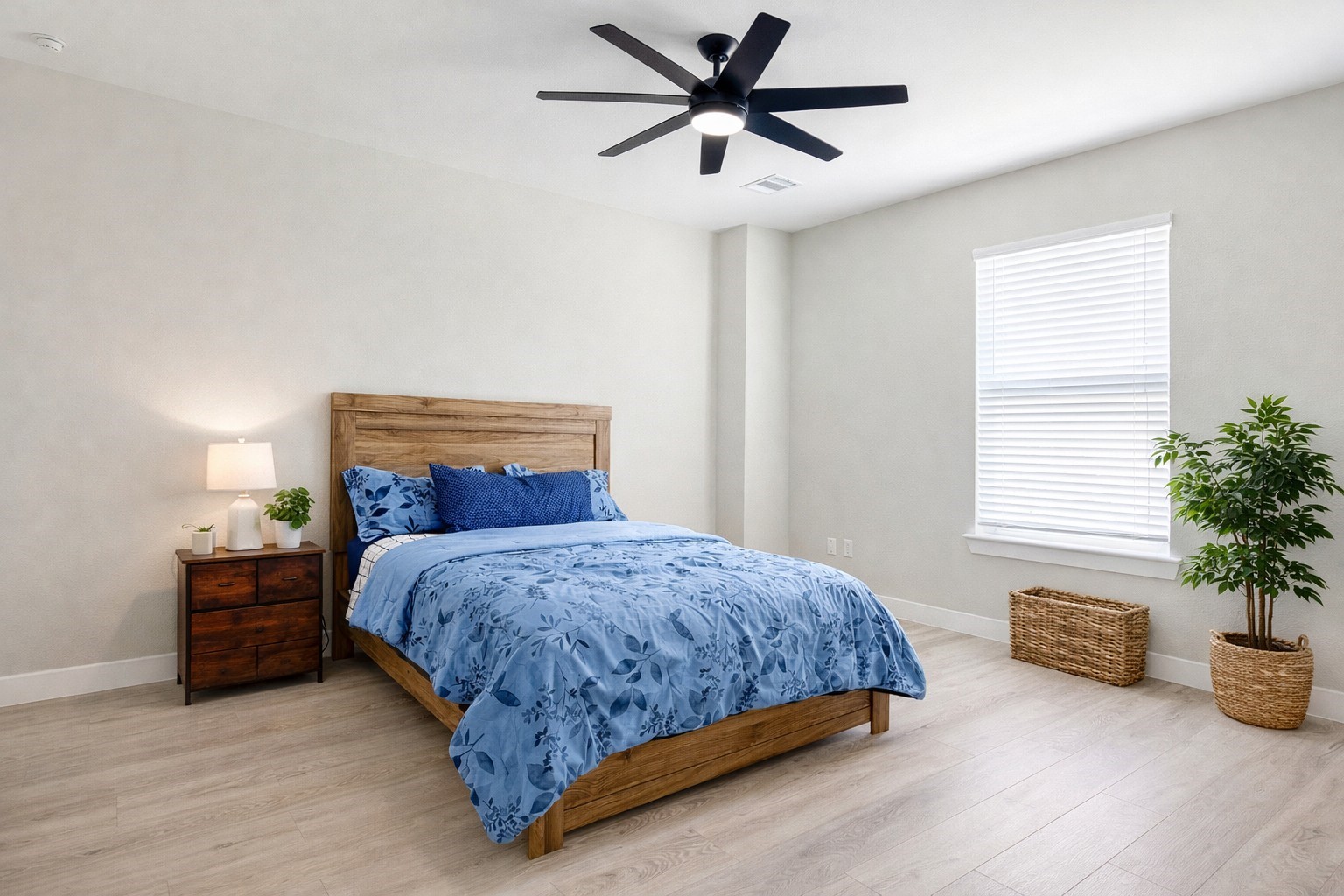 10115 Porto Rico Road Houston, TX 77041 - Photo 11 of 17 a bedroom with bed and a potted plant