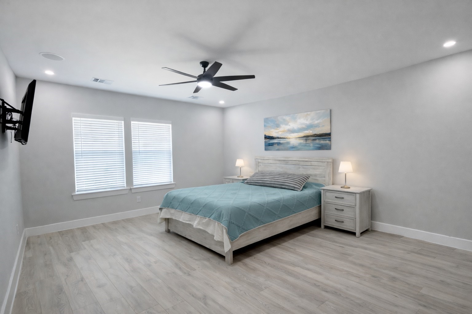 10115 Porto Rico Road Houston, TX 77041 - Photo 15 of 17 a bedroom with a bed and a chandelier