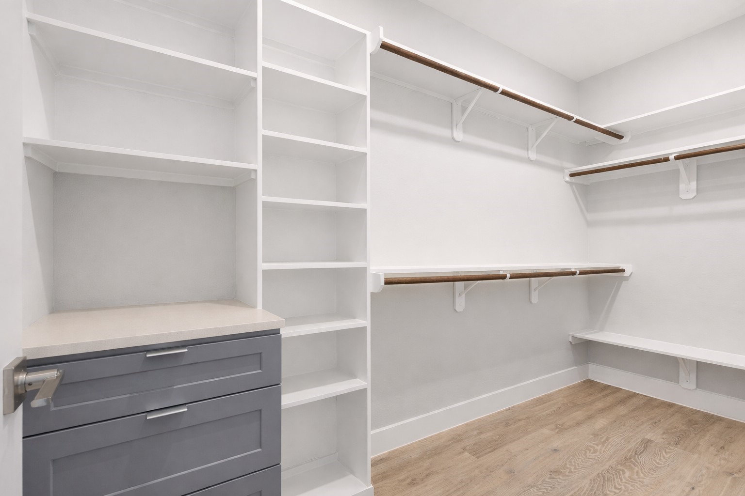 10115 Porto Rico Road Houston, TX 77041 - Photo 17 of 17 a view of walk in closet with empty racks