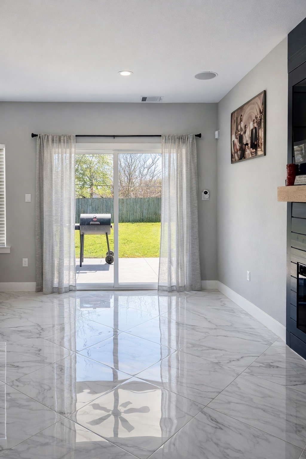 10115 Porto Rico Road Houston, TX 77041 - Photo 9 of 17 wooden floor in an empty room with a window