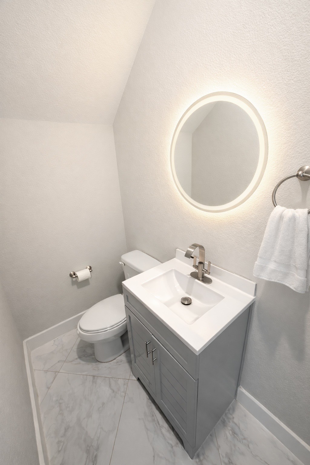 10115 Porto Rico Road Houston, TX 77041 - Photo 10 of 17 a bathroom with a sink mirror and toilet