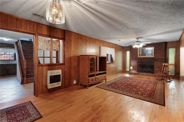 a view of livingroom with kitchen and dining area