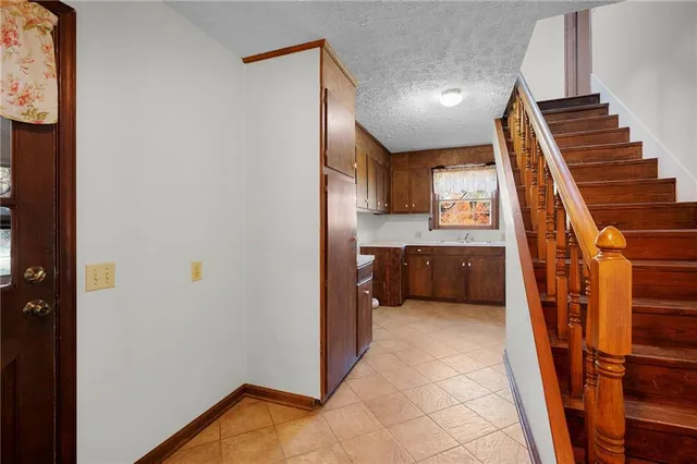 a view of a kitchen with a sink