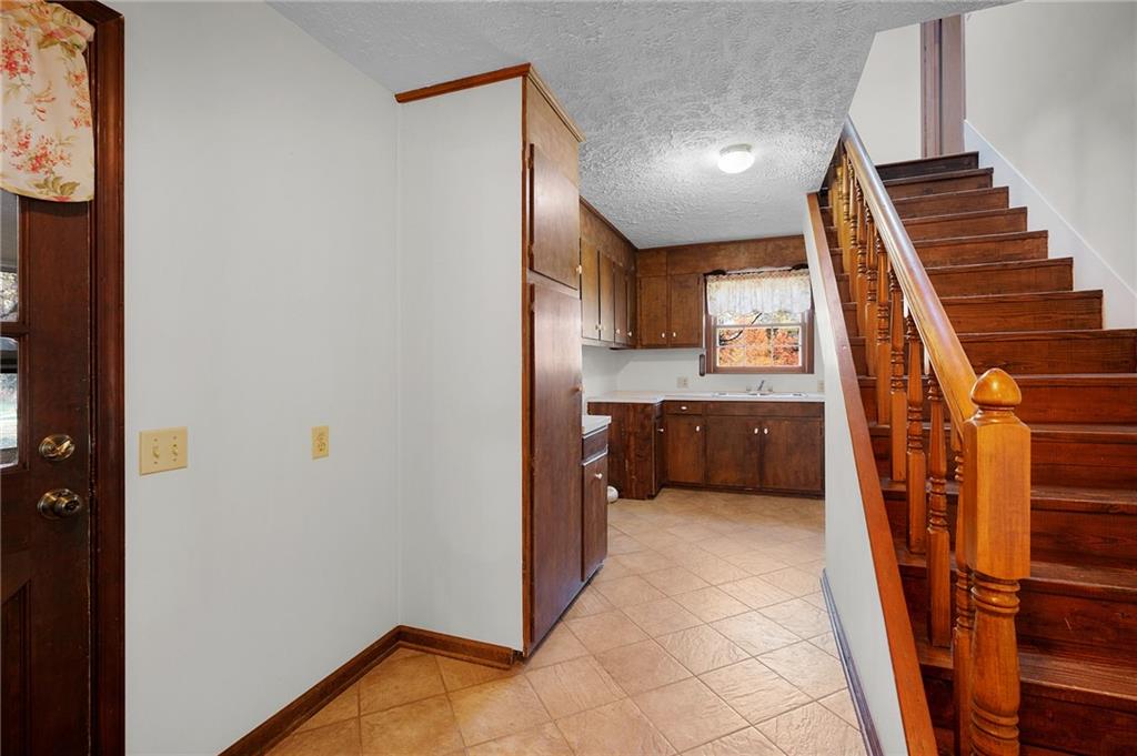 3293 Rome Road Southwest Plainville, GA 30733 - Photo 15 of 42 a view of a kitchen with a sink