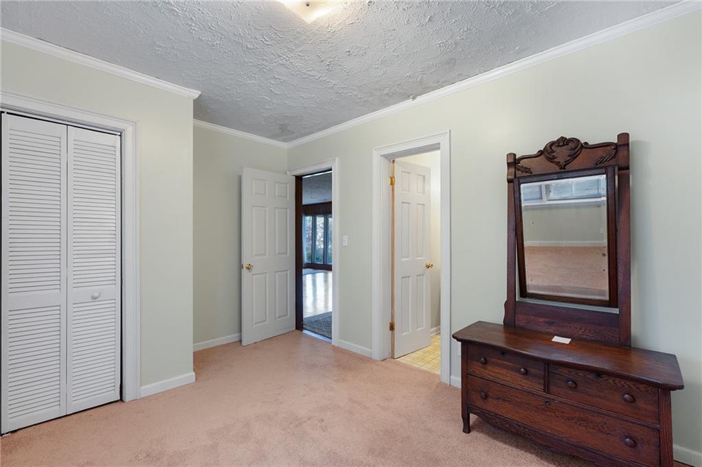 3293 Rome Road Southwest Plainville, GA 30733 - Photo 28 of 42 a view of room with furniture and mirror