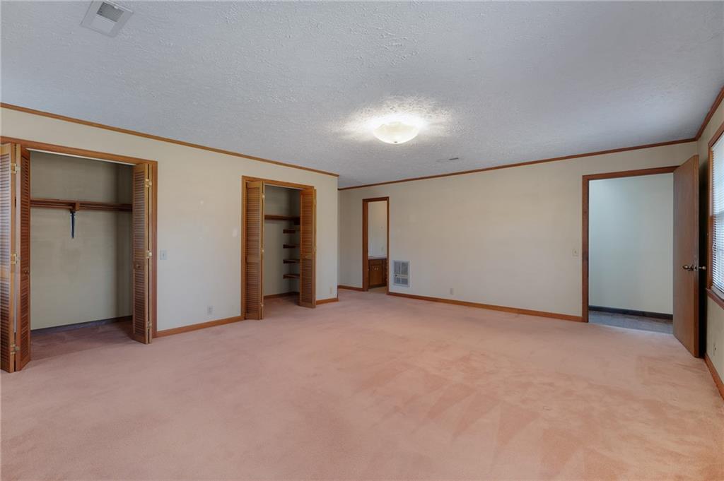 3293 Rome Road Southwest Plainville, GA 30733 - Photo 31 of 42 an empty room with an entryway