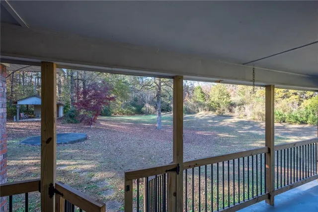 a view of a porch with furniture
