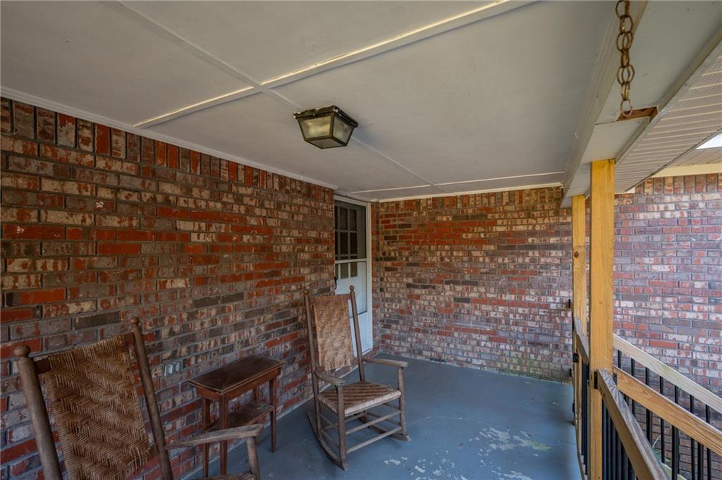 3293 Rome Road Southwest Plainville, GA 30733 - Photo 36 of 42 a view of an empty room and wooden floor