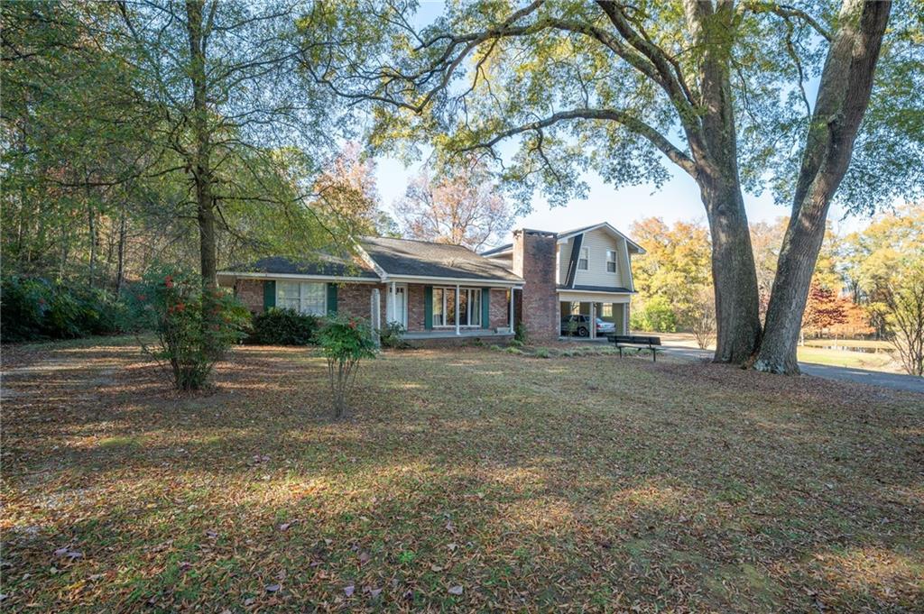 3293 Rome Road Southwest Plainville, GA 30733 - Photo 4 of 42 a view of a yard in front of the house