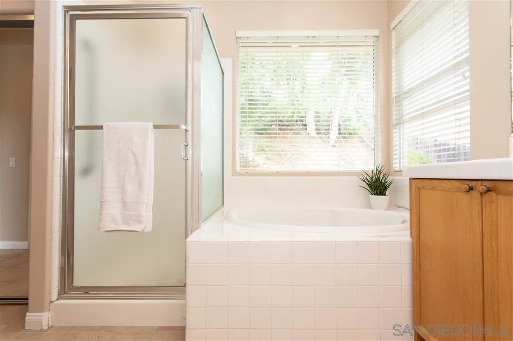 805 La Rue Avenue Fallbrook, CA 92028 - Photo 13 of 25 a bathroom with a bathtub and a shower