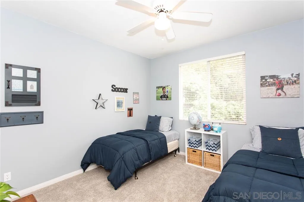 805 La Rue Avenue Fallbrook, CA 92028 - Photo 14 of 25 a bedroom with a bed and a window