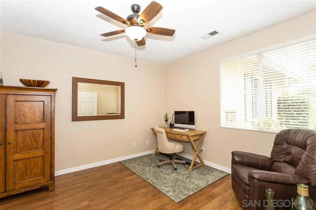805 La Rue Avenue Fallbrook, CA 92028 - Photo 10 of 25 a work room with furniture and windows