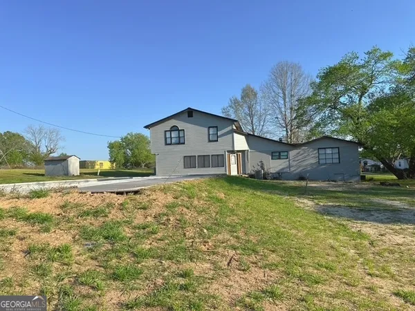 a house view with a outdoor space