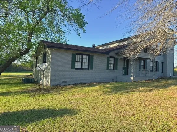 a view of a house with a swimming pool