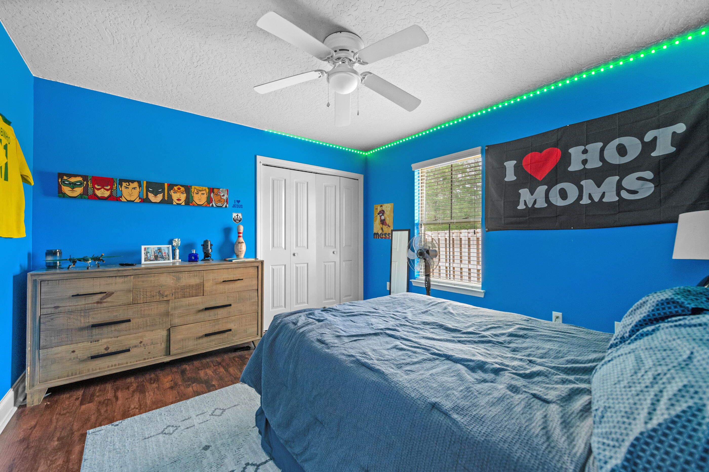 4509 Beth Circle Crestview, FL 32539 - Photo 12 of 29 a bedroom with a bed and a dresser