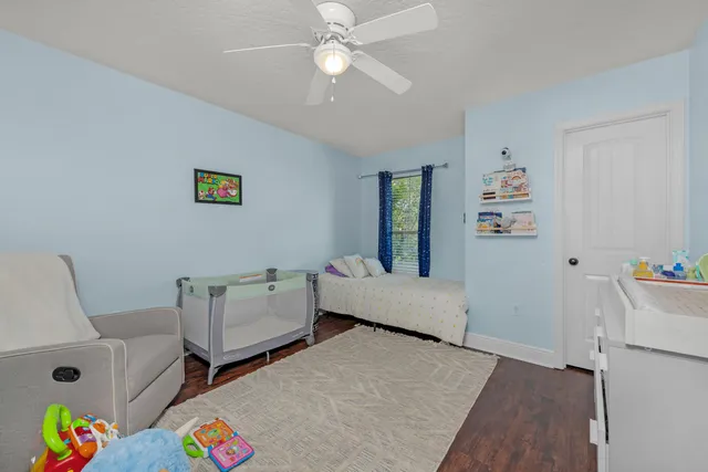 a bed room with a bed and furniture