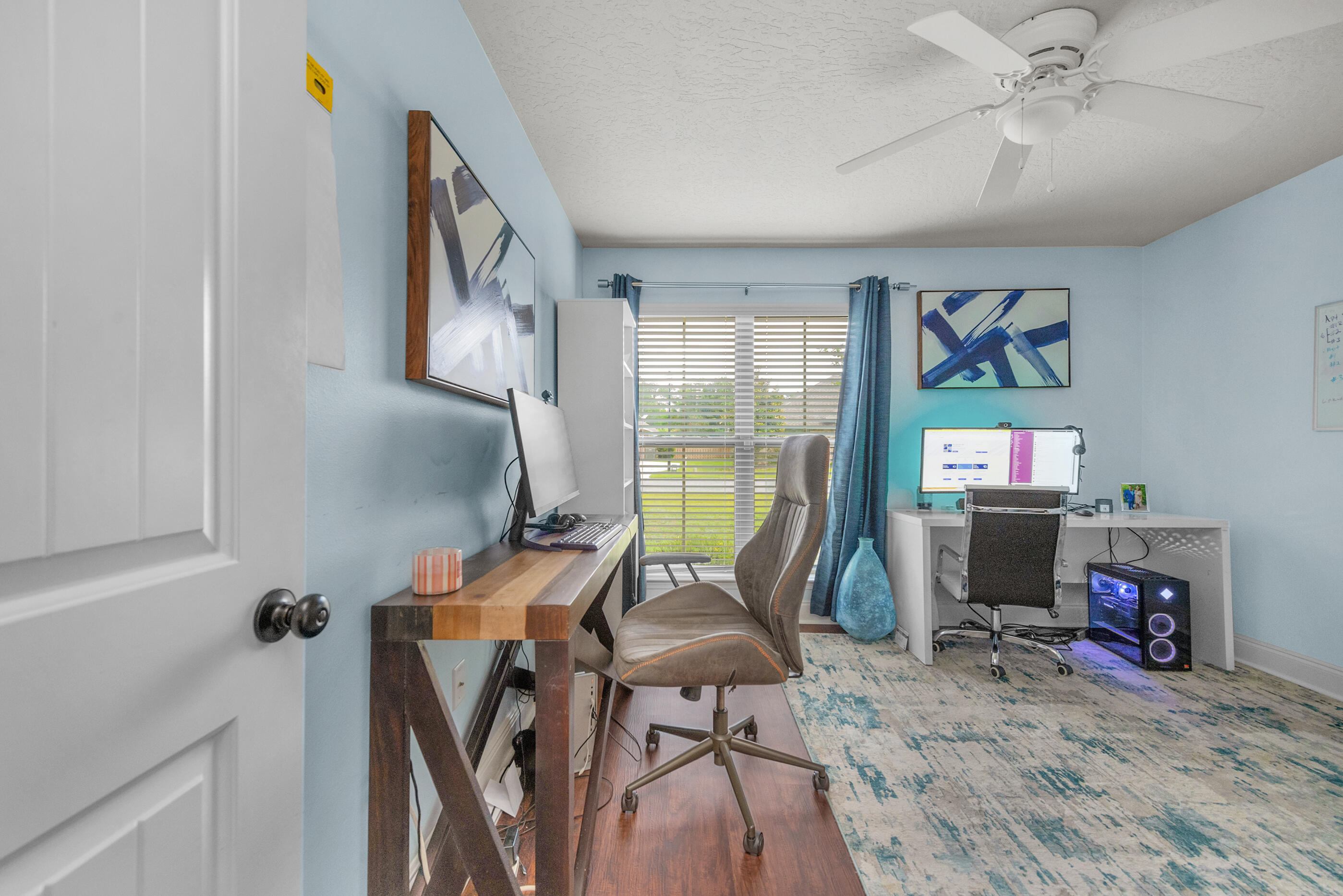 4509 Beth Circle Crestview, FL 32539 - Photo 15 of 29 a view of a workspace with furniture and a window