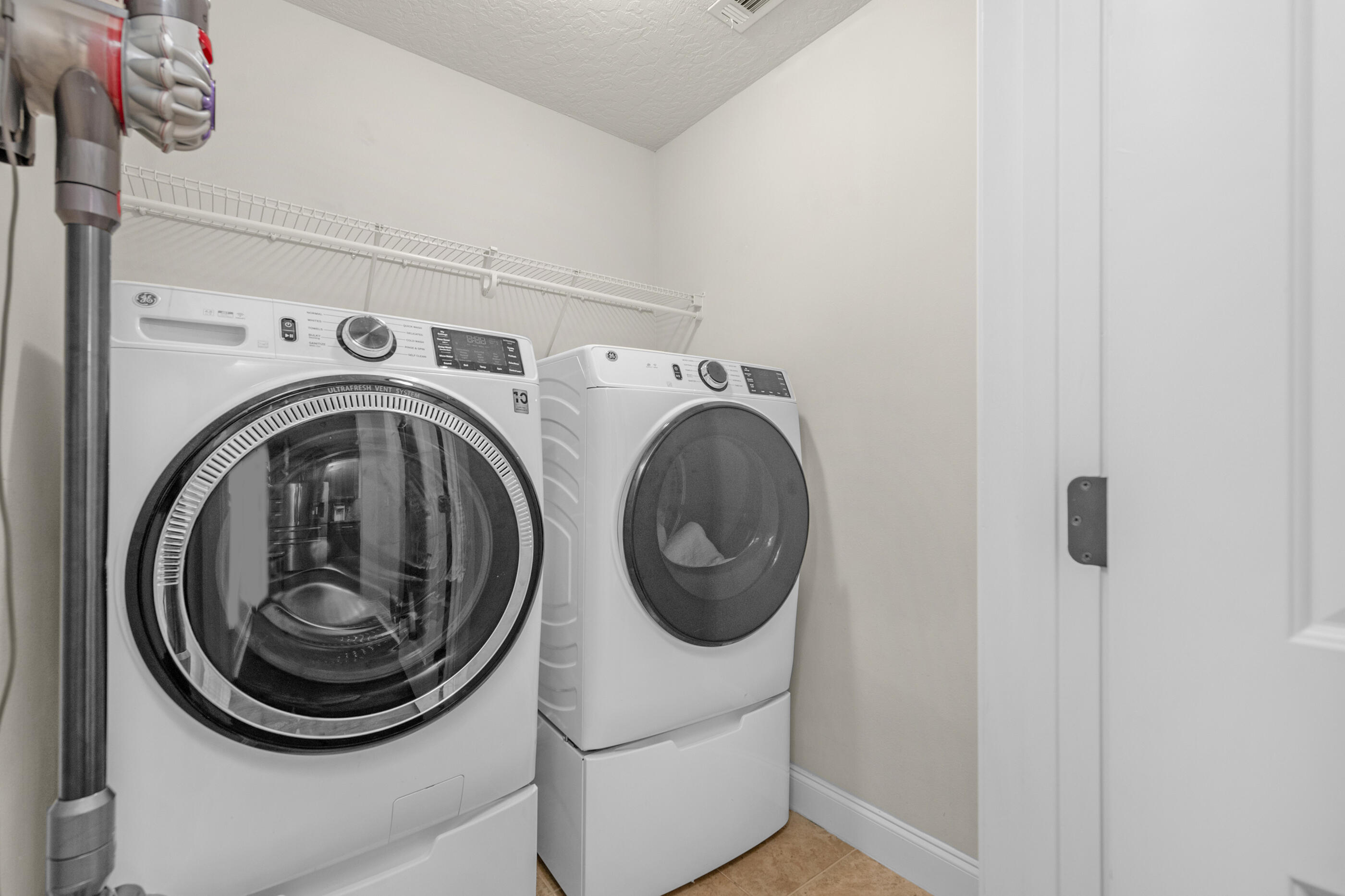 4509 Beth Circle Crestview, FL 32539 - Photo 23 of 29 a utility room with dryer and washer