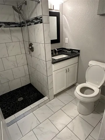 a view of a balcony with wooden floor