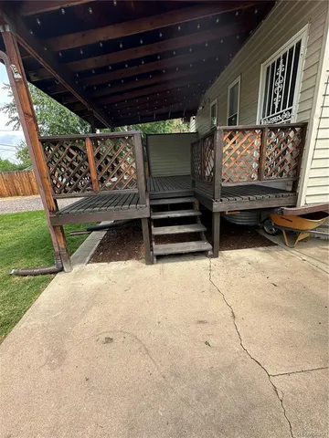 a balcony with wooden floor