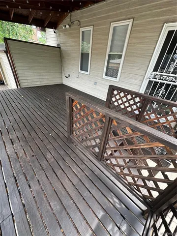 a view of a yard with a large tree