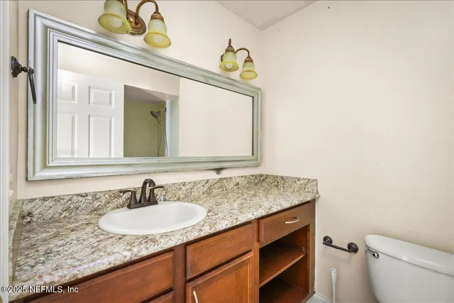 a bathroom with a sink and a toilet