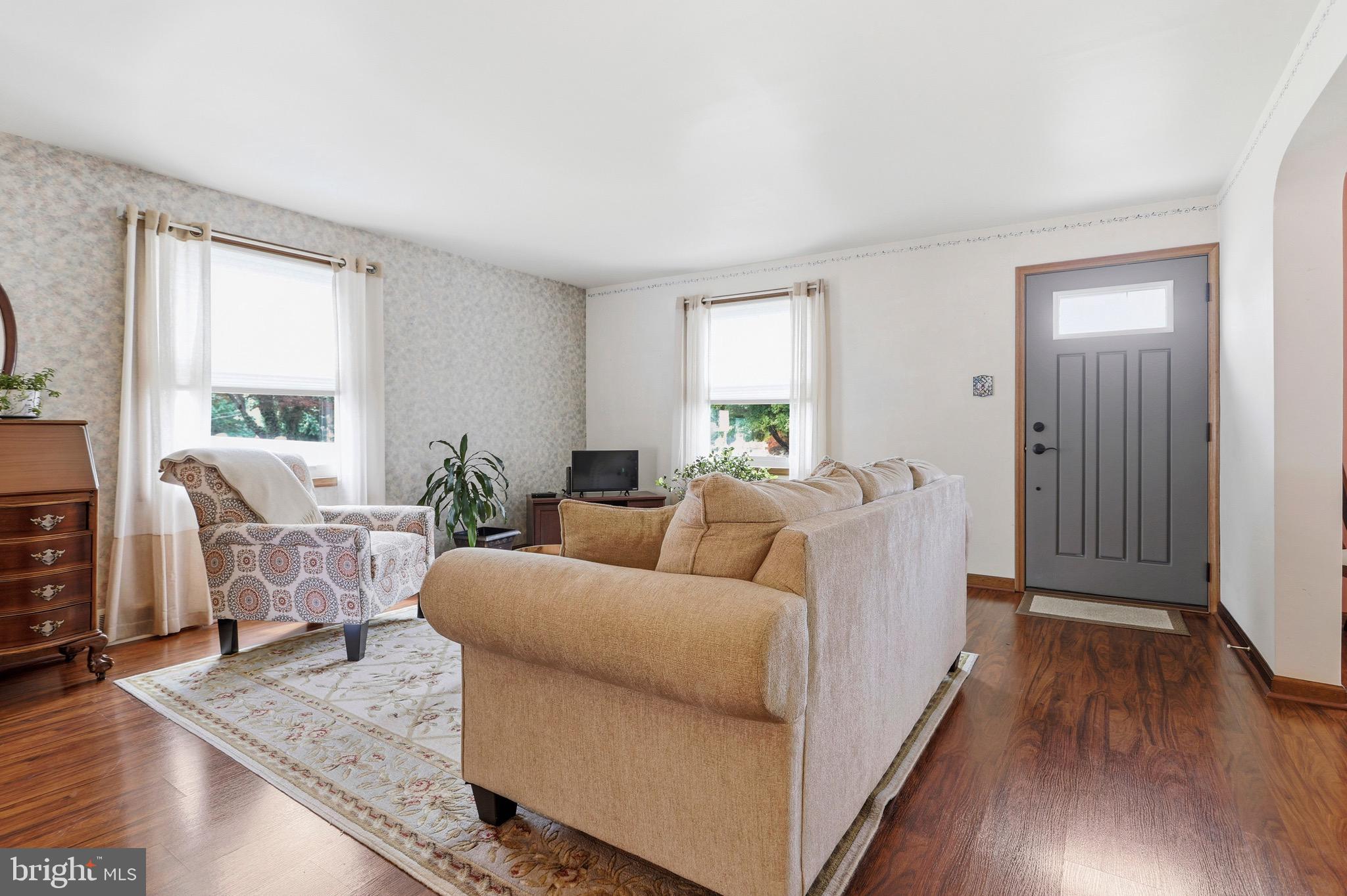 527 Saxer Avenue Springfield, PA 19064 - Photo 5 of 33 a living room with furniture and wooden floor