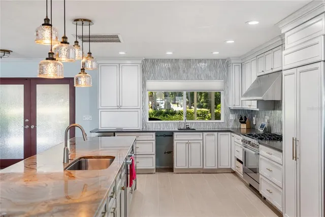 a view of a living room with furniture and a window
