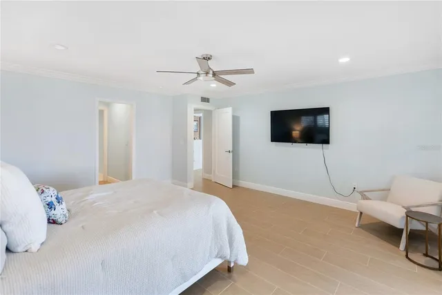 a backyard of a house with barbeque oven and outdoor seating
